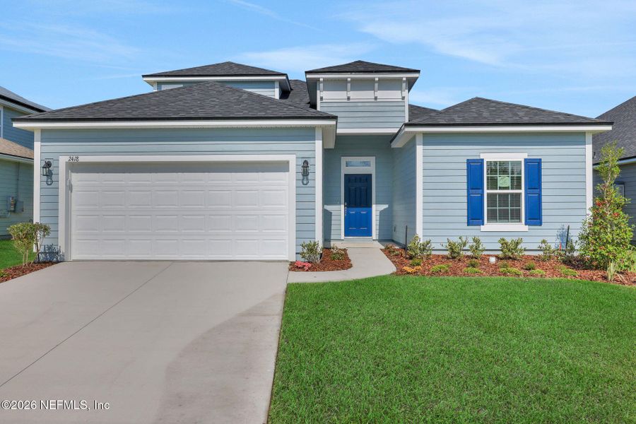 Front exterior of a new home in Jennings Farm, Middleburg, FL, highlighting curb appeal (Image 25).