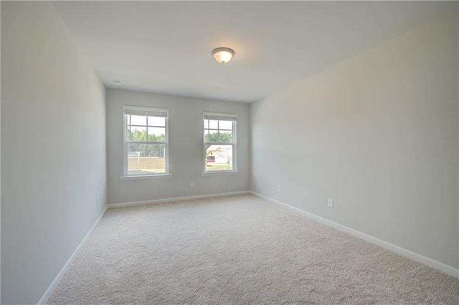 Spacious, unfurnished interior of a new home in Northcroft, Loganville (Image 19).