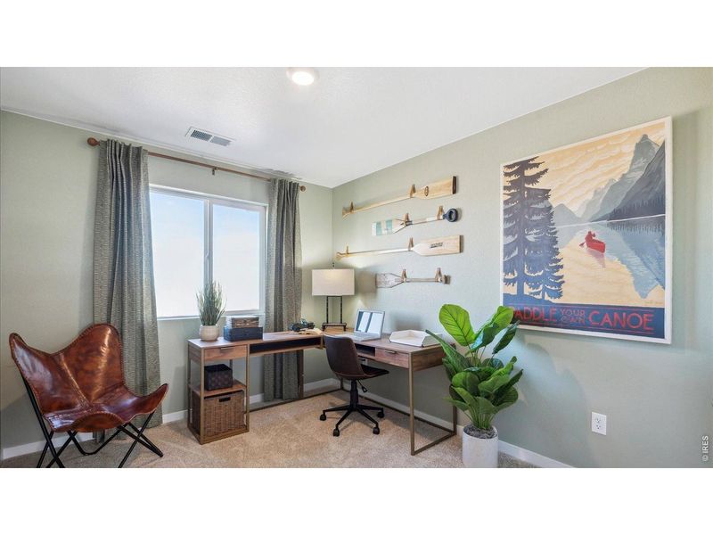 Furnished interior view inside a new home in Villas at Vantage, Berthoud (Image 17).