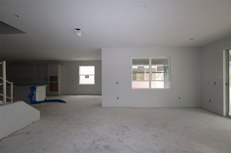 In-progress construction of a new home in Lake Star at Ovation, Winter Garden, FL (Image 17).