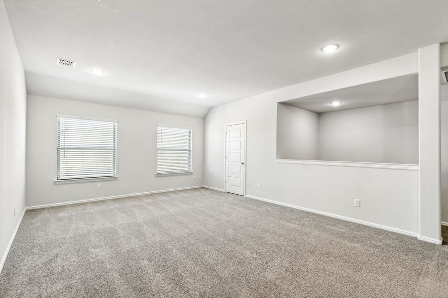 Game Room in the Sapphire home plan by Trophy Signature Homes – REPRESENTATIVE PHOTO Game Room in the Sapphire home plan by Trophy Signature Homes – REPRESENTATIVE PHOTO