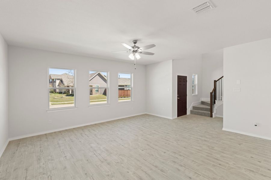 Front exterior of a new home in Heartland, Crandall, TX, highlighting curb appeal (Image 15).