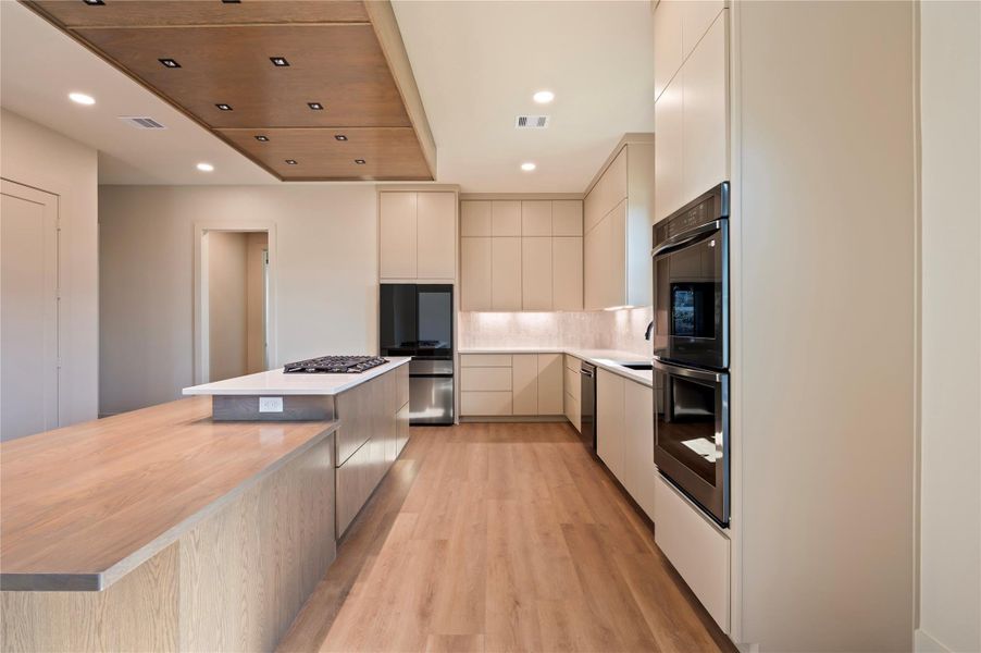 Viking appliances, double oven, floor to ceiling custom cabinetry, accent lighting and so much more Viking appliances, double oven, floor to ceiling custom cabinetry, accent lighting and so much more