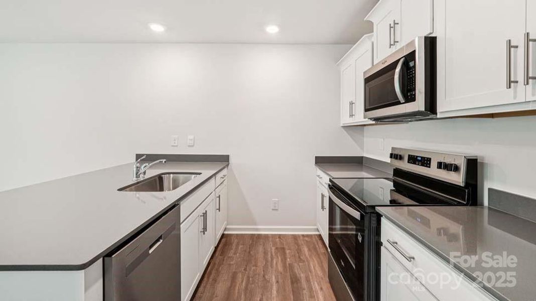 Furnished interior view inside a new home in Mallard Creek Townhomes, Charlotte (Image 2). Furnished interior view inside a new home in Mallard Creek Townhomes, Charlotte (Image 2).