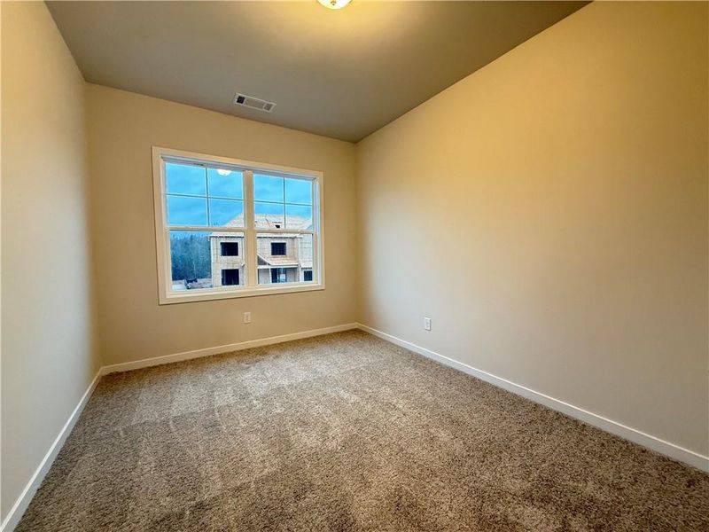 Spacious, unfurnished interior of a new home in Ponderosa Farms Manor, Gainesville (Image 32).
