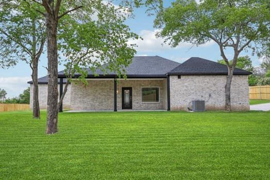 Front exterior of a new home in , Dallas, TX, highlighting curb appeal (Image 15).