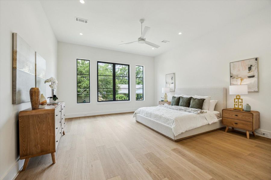 Primary suite on the first floor - has great views of the backyard through RAM windows.