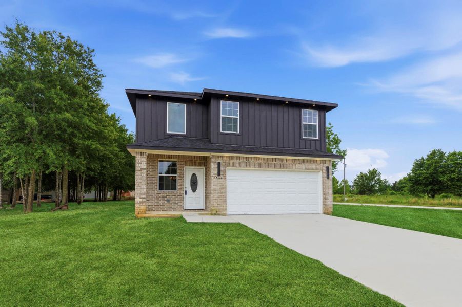 Front exterior of a new home in , Cleveland, TX, highlighting curb appeal (Image 36). Front exterior of a new home in , Cleveland, TX, highlighting curb appeal (Image 36).