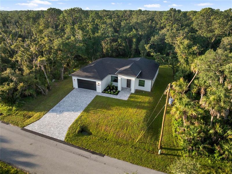 Front exterior of a new home in , Port Charlotte, FL, highlighting curb appeal (Image 31).