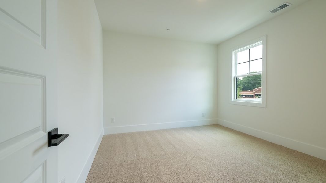 Representative unfurnished interior of a home built from the Hanover by D.R. Horton in The Village at Sandy Plains, Marietta (Image 28).