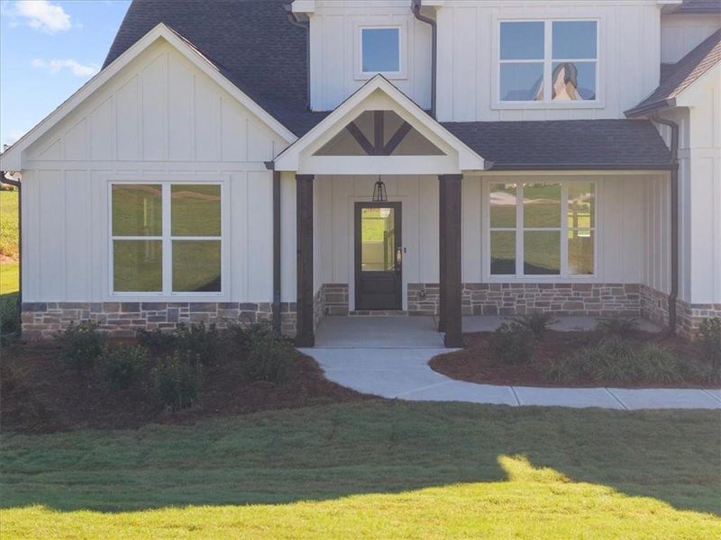 Front exterior of a new home in , Cumming, GA, highlighting curb appeal (Image 28).