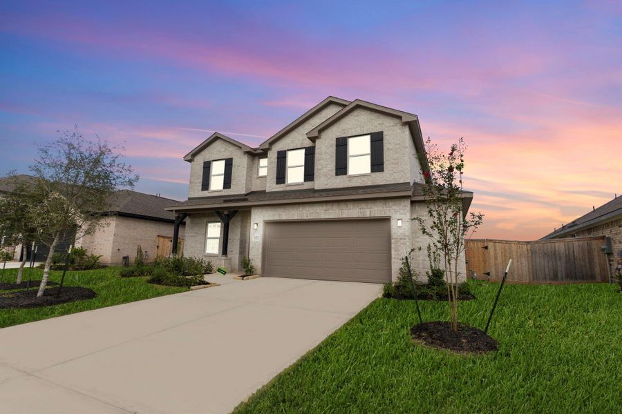 Capture the charm of this home at sunset—soft evening lighting enhances its curb appeal, making it the perfect place to come home to every day. Capture the charm of this home at sunset—soft evening lighting enhances its curb appeal, making it the perfect place to come home to every day.