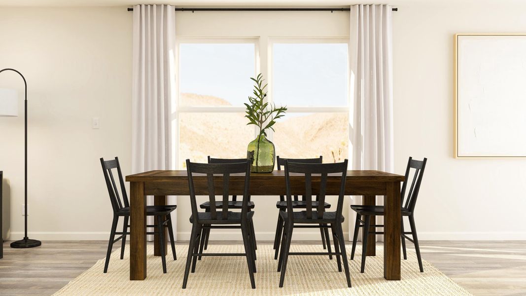 A dining table with chairs around it.