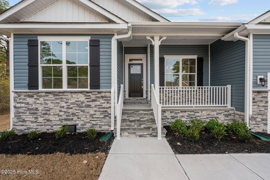 Exterior details and patio area of a home in Fairfield Harbour, New Bern (Image 3).