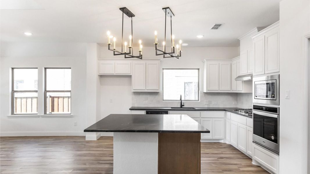 Furnished interior view inside a new home in Creekview Meadows, Pilot Point (Image 7).