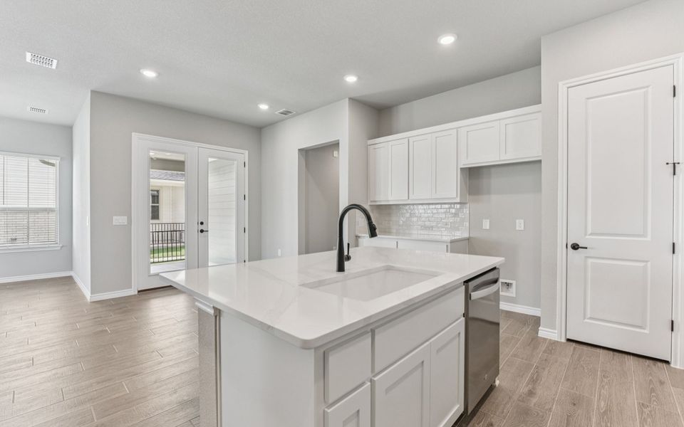 Furnished interior view inside a new home in Kissing Tree, San Marcos (Image 4).