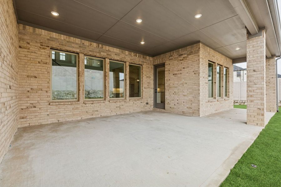 Exterior details and patio area of a home in Painted Tree Lakeside, McKinney (Image 3). Exterior details and patio area of a home in Painted Tree Lakeside, McKinney (Image 3).