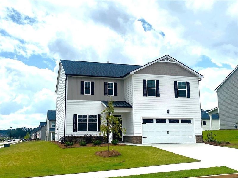 Front exterior of a new home in Preserve at Dove Creek, Statham, GA, highlighting curb appeal (Image 28).