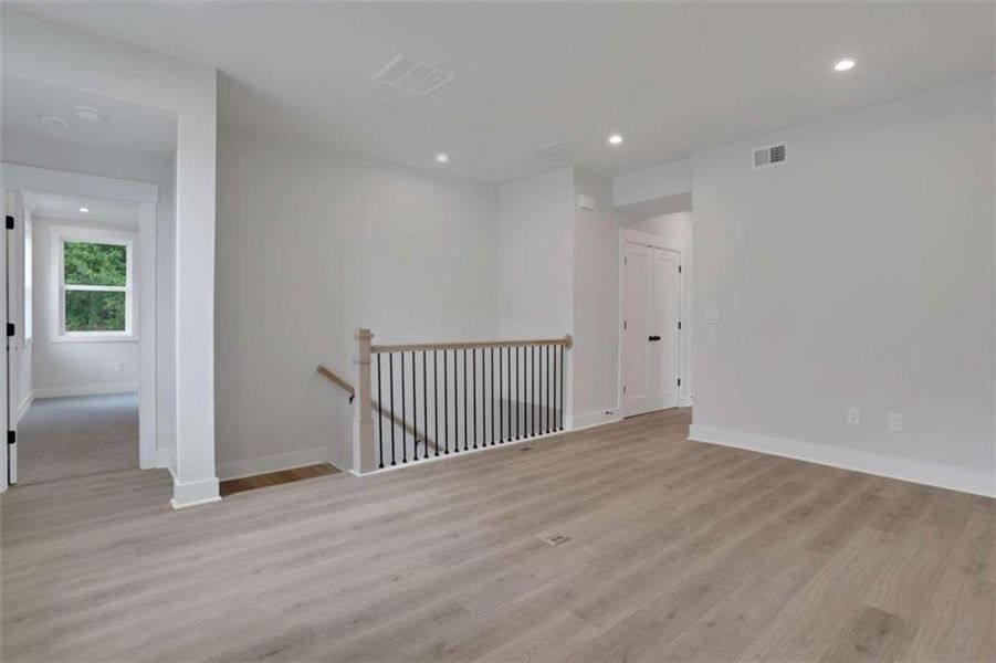 Spacious, unfurnished interior of a new home in The Paddocks at Doc Hughes, Buford (Image 45).