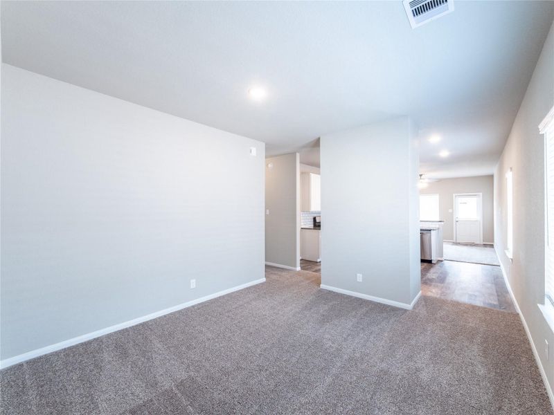 Spacious, unfurnished interior of a new home in Sweetgrass Village, Crosby (Image 7).