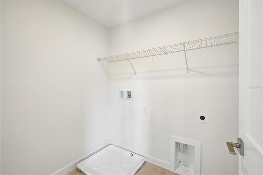 Spacious, unfurnished interior of a new home in Grasslands West, Lakeland (Image 37).