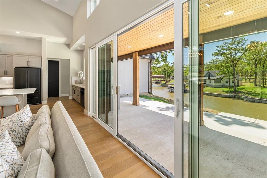 Back patio with outdoor Outdoor kitchen sink and quartz countertops, water view