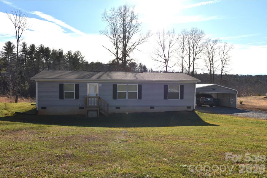 Exterior details and patio area of a home in , Lenoir (Image 21).
