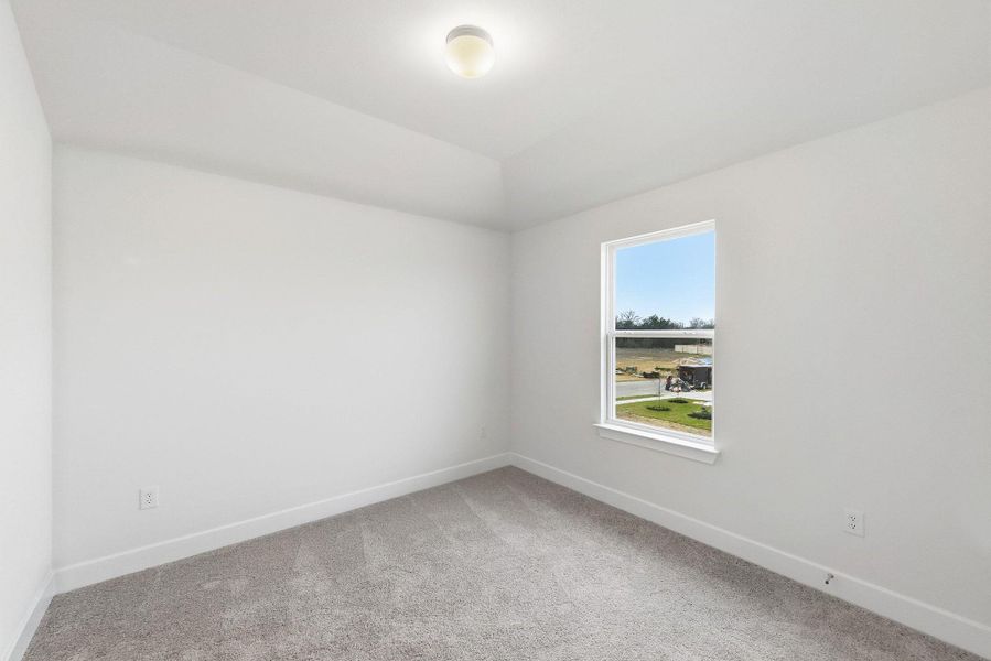 Spacious, unfurnished interior of a new home in The Colony, Bastrop (Image 41).
