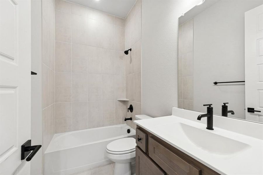 Furnished interior view inside a new home in South Pointe  Cottage Series, Mansfield (Image 7).