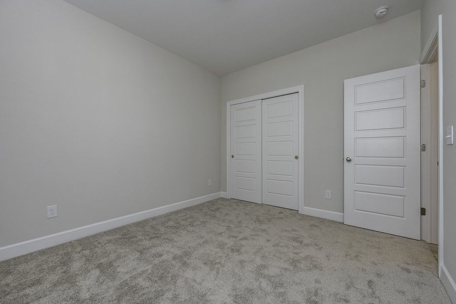 Representative unfurnished interior of a home built from the The Hunter by Cothran Homes in Holly Ridge, Greenville (Image 24).