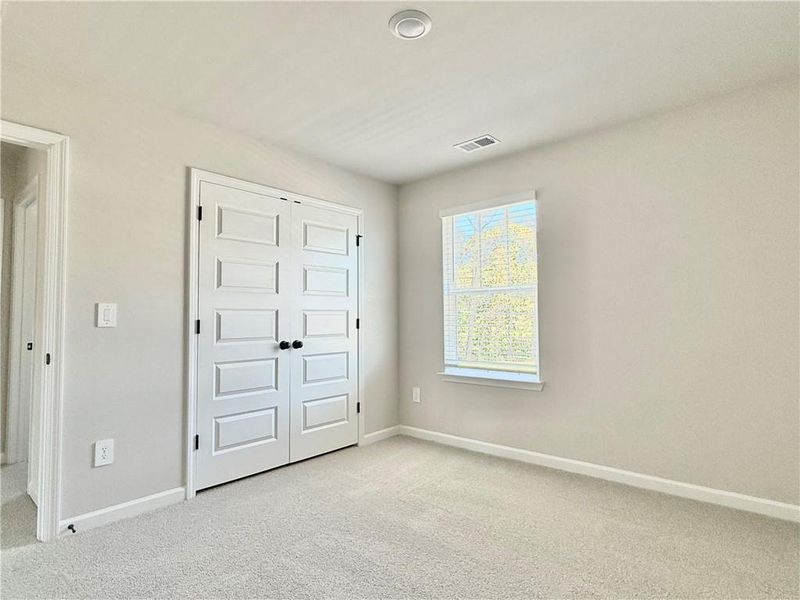 Spacious, unfurnished interior of a new home in Vines at Mill Creek - Estate Series, Braselton (Image 20). Spacious, unfurnished interior of a new home in Vines at Mill Creek - Estate Series, Braselton (Image 20).