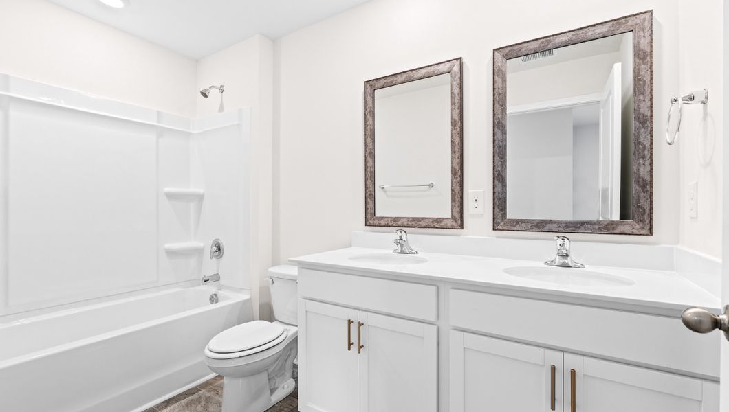 Representative furnished interior of a home built from the ELSTON by D.R. Horton in Harrier Point, Woodruff (Image 12).