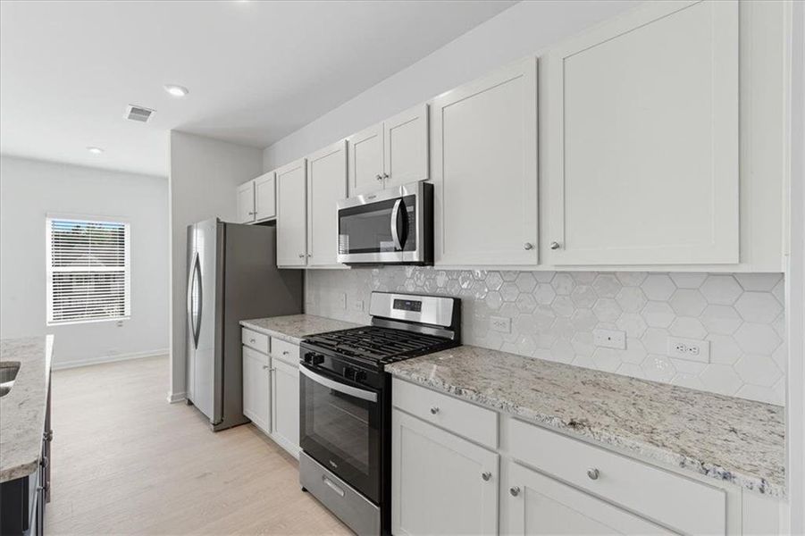 Furnished interior view inside a new home in Park Center Pointe, Austell (Image 8). Furnished interior view inside a new home in Park Center Pointe, Austell (Image 8).