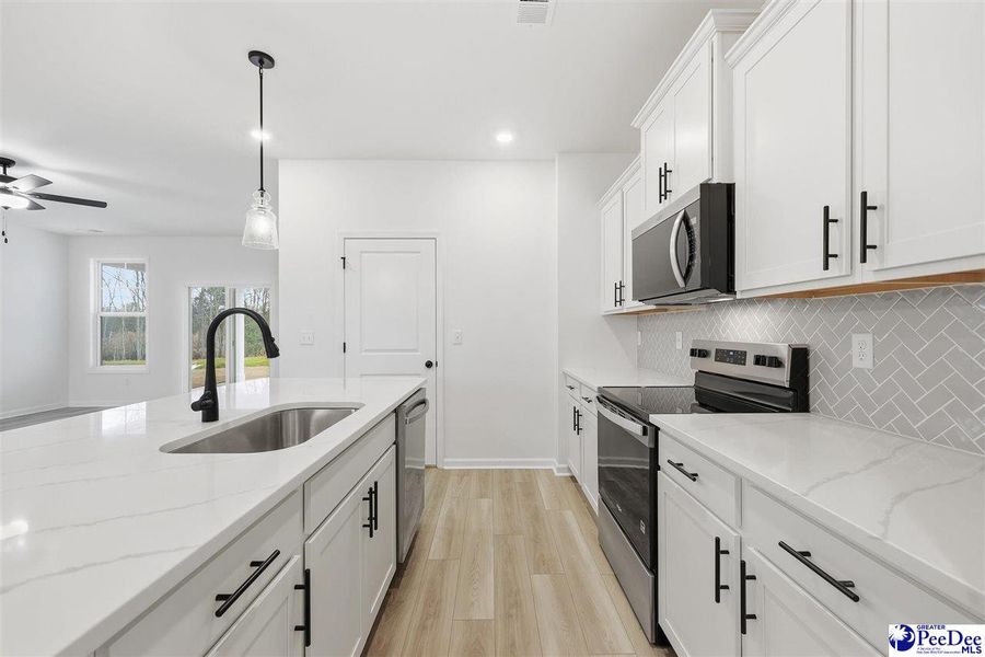 Furnished interior view inside a new home in Spring Haven, Florence (Image 6).