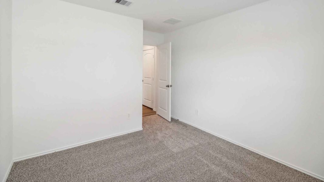 Spacious, unfurnished interior of a new home in Grand Pines, Magnolia (Image 21).