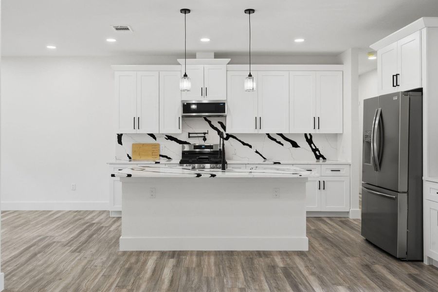 Furnished interior view inside a new home in , Conroe (Image 8).