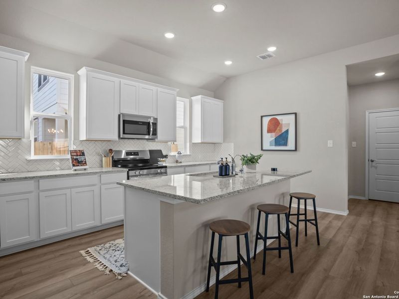 Furnished interior view inside a new home in Hannah Heights, Seguin (Image 15).