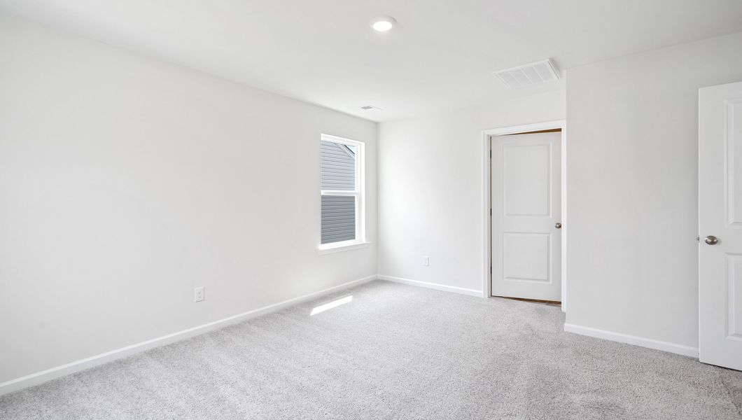 Representative unfurnished interior of a home built from the AISLE by D.R. Horton in Harrier Point, Woodruff (Image 20).