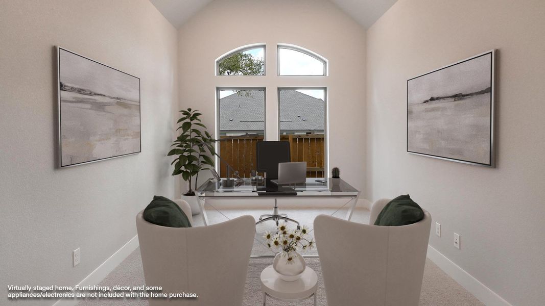 Home office with vaulted ceiling