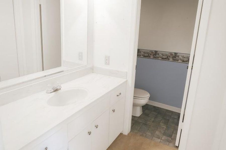 Furnished interior view inside a new home in , Mineola (Image 13).