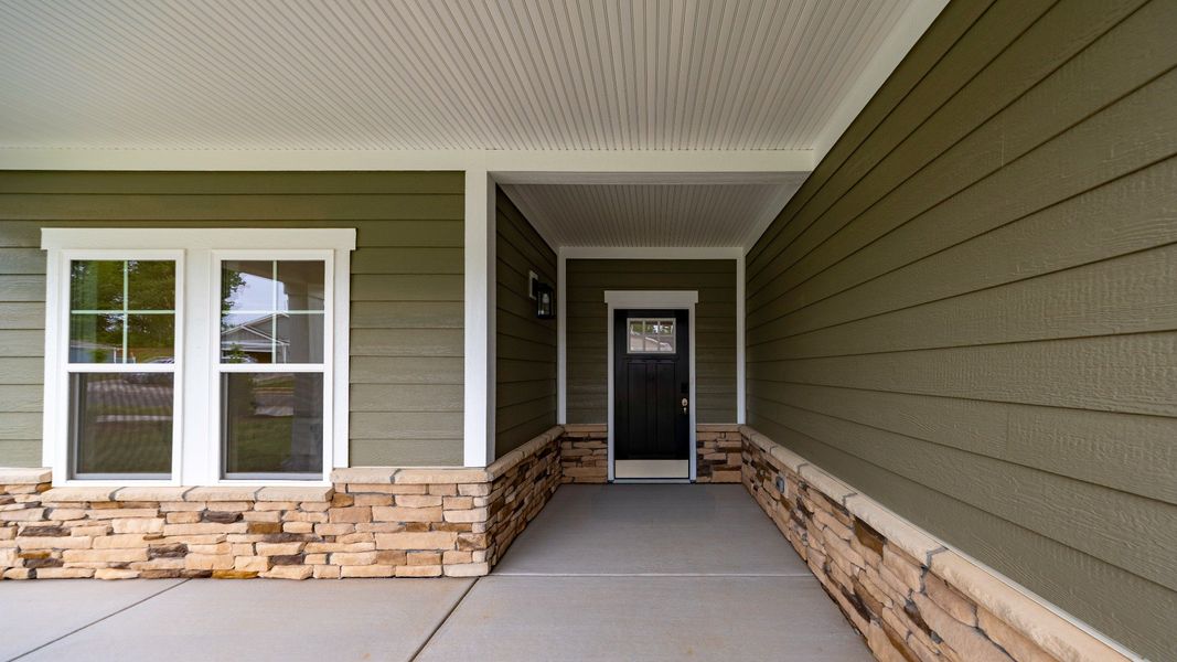 Exterior details and patio area of a home in The Villas at Pinewood, Asheboro (Image 2). Exterior details and patio area of a home in The Villas at Pinewood, Asheboro (Image 2).