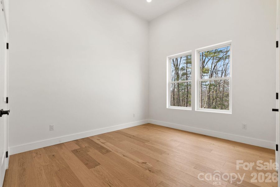 Spacious, unfurnished interior of a new home in , Asheville (Image 24).