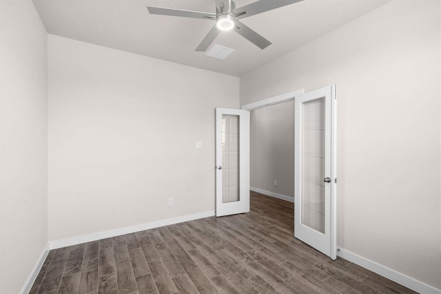 Spacious, unfurnished interior of a new home in Sunterra Lakes, Fulshear (Image 34).