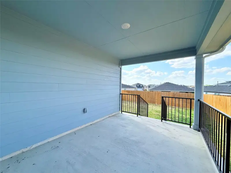 Fenced backyard with a patio Fenced backyard with a patio