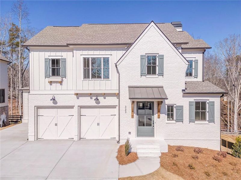 Front exterior of a new home in Malone's Pond, Ball Ground, GA, highlighting curb appeal (Image 25).
