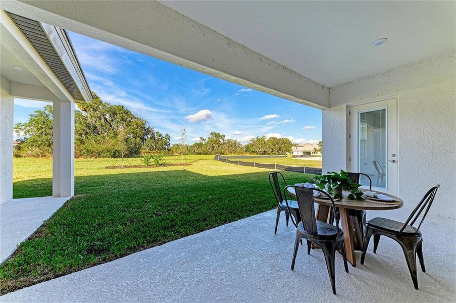 Exterior details and patio area of a home in Triple Creek, Riverview (Image 2). Exterior details and patio area of a home in Triple Creek, Riverview (Image 2).