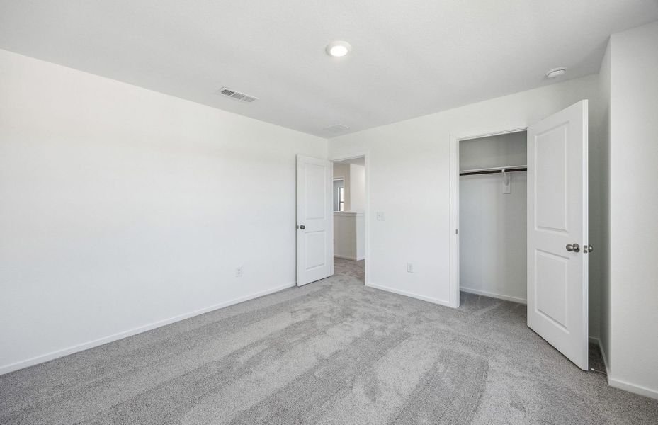 Spacious, unfurnished interior of a new home in Mavera, Conroe (Image 32). Spacious, unfurnished interior of a new home in Mavera, Conroe (Image 32).