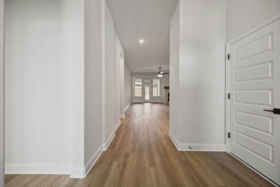 Representative unfurnished interior of a home built from the Caldwell by Chesmar Homes in Summer Crest, Crowley (Image 9).