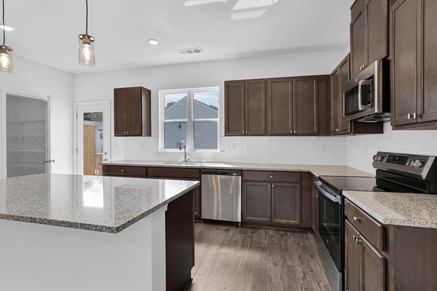 Furnished interior view inside a new home in Somerset at Veterans Memorial, Mableton (Image 12).