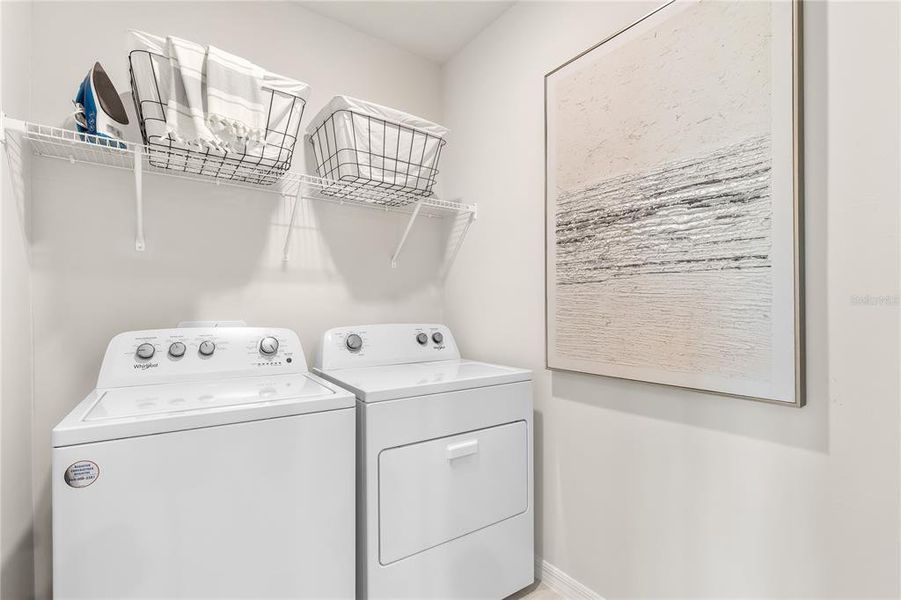 Furnished interior view inside a new home in Central Parc, North Port (Image 13). Furnished interior view inside a new home in Central Parc, North Port (Image 13).